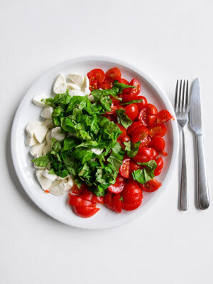 Caprese salad with tomatoes, basil and mozzarella