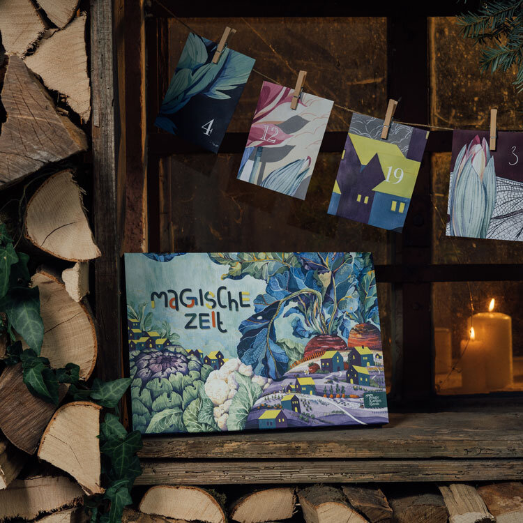 Organic seed advent calendar “Magical Time” Grow-Your-Own Garden Feast by firewood, door cards behind